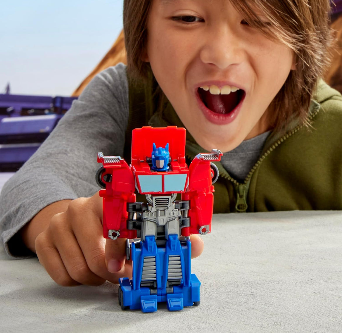 Transformers EarthSpark 1-Step Smash Changers Optimus Prime 4-Inch Action Figure, Robot Toys for Boys and Girls 6 and Up