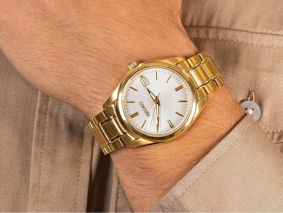 Seiko Mans Benodigdhede Staal Tweekleur Japannese Kwarts Goue Band