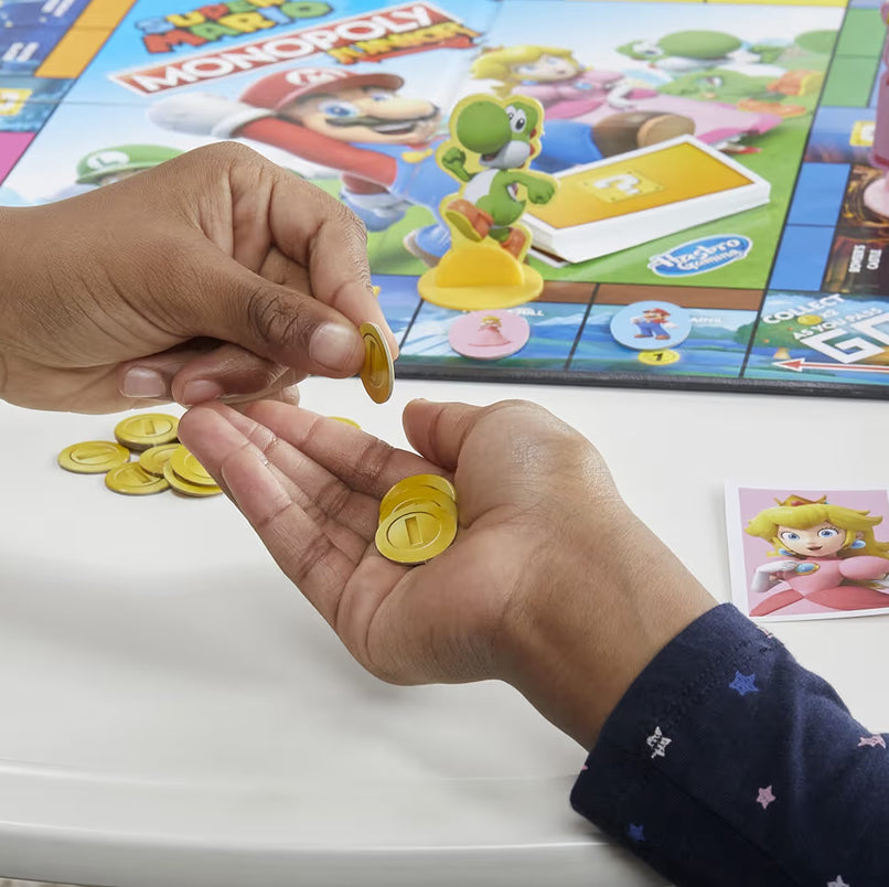 Monopoly Junior Super Mario Edition Board Game - Explore The Mushroom Kingdom as Mario, Peach, Yoshi, or Luigi
