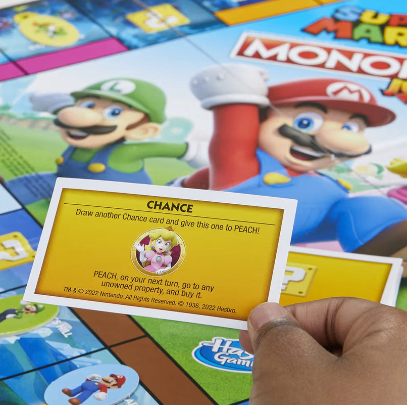 Monopoly Junior Super Mario Edition Board Game - Explore The Mushroom Kingdom as Mario, Peach, Yoshi, or Luigi