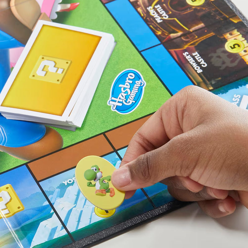 Monopoly Junior Super Mario Edition Board Game - Explore The Mushroom Kingdom as Mario, Peach, Yoshi, or Luigi
