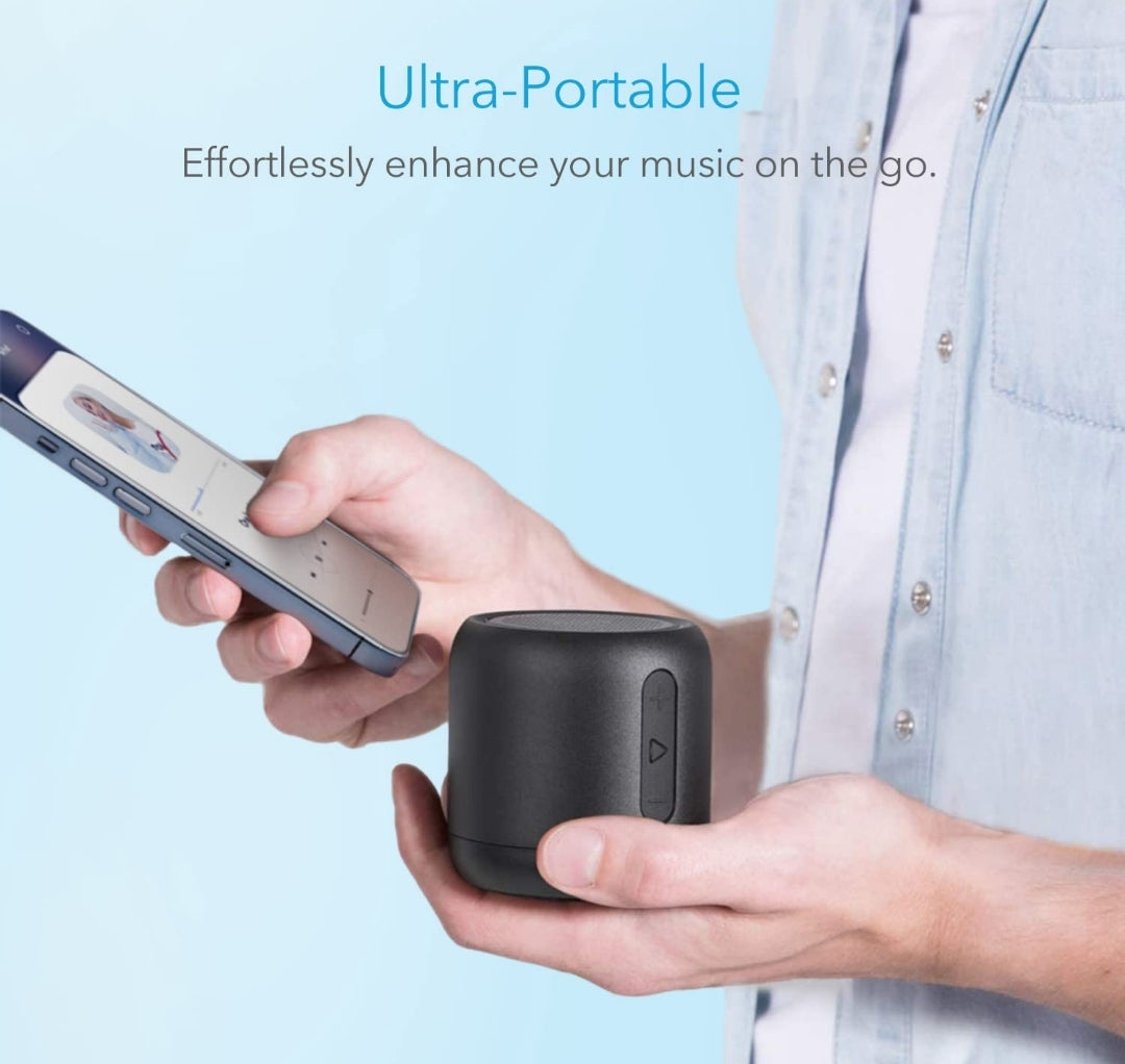 Soundcore Anker Mini, Super-Portable Bluetooth Speaker with FM Radio, 15-Hour Playtime, 66 ft Bluetooth Range, Enhanced Bass, Noise-Cancelling Microphone for Leisure and Work Use